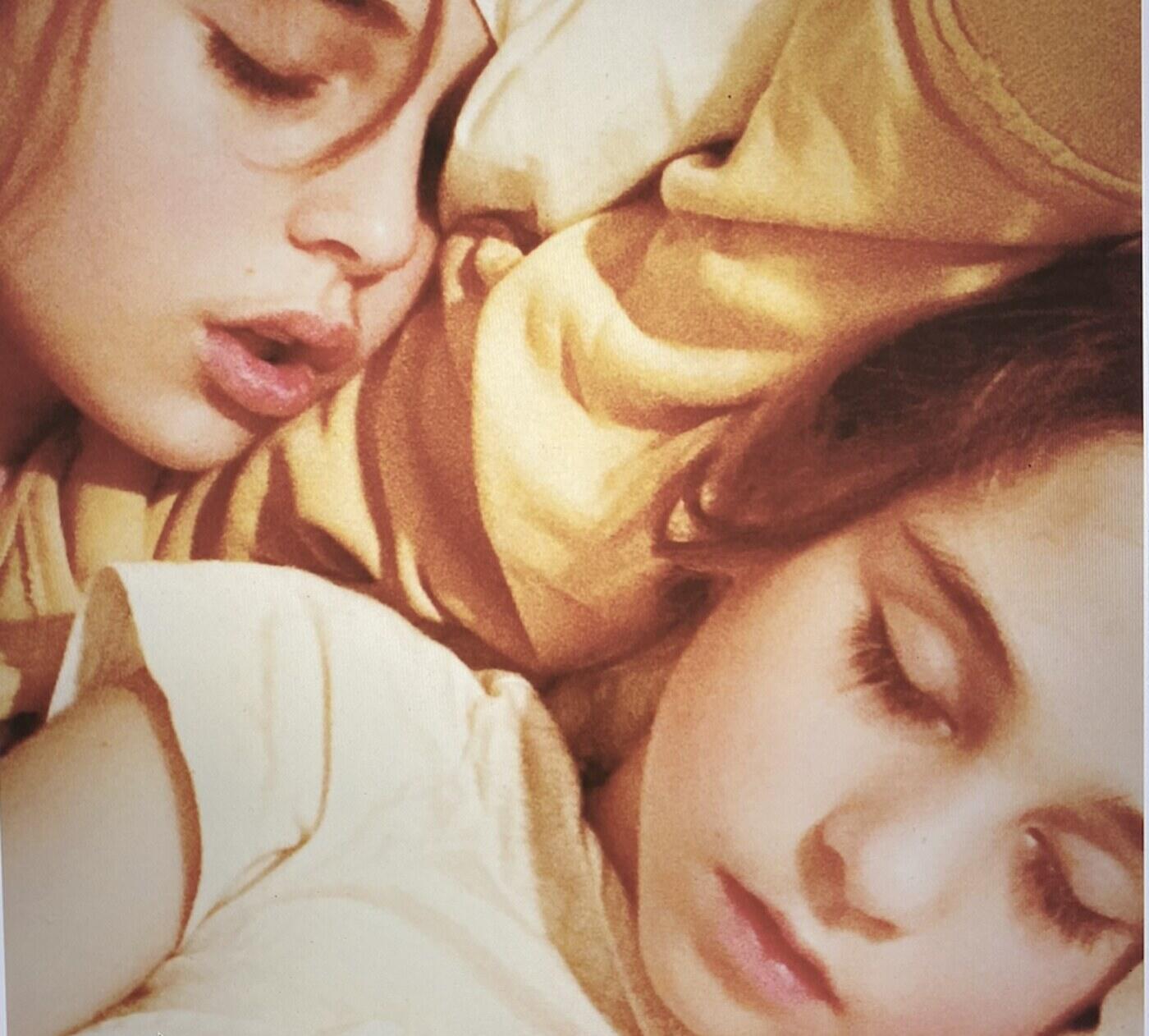 Stella and a friend asleep, sun-warmed and sepia-toned