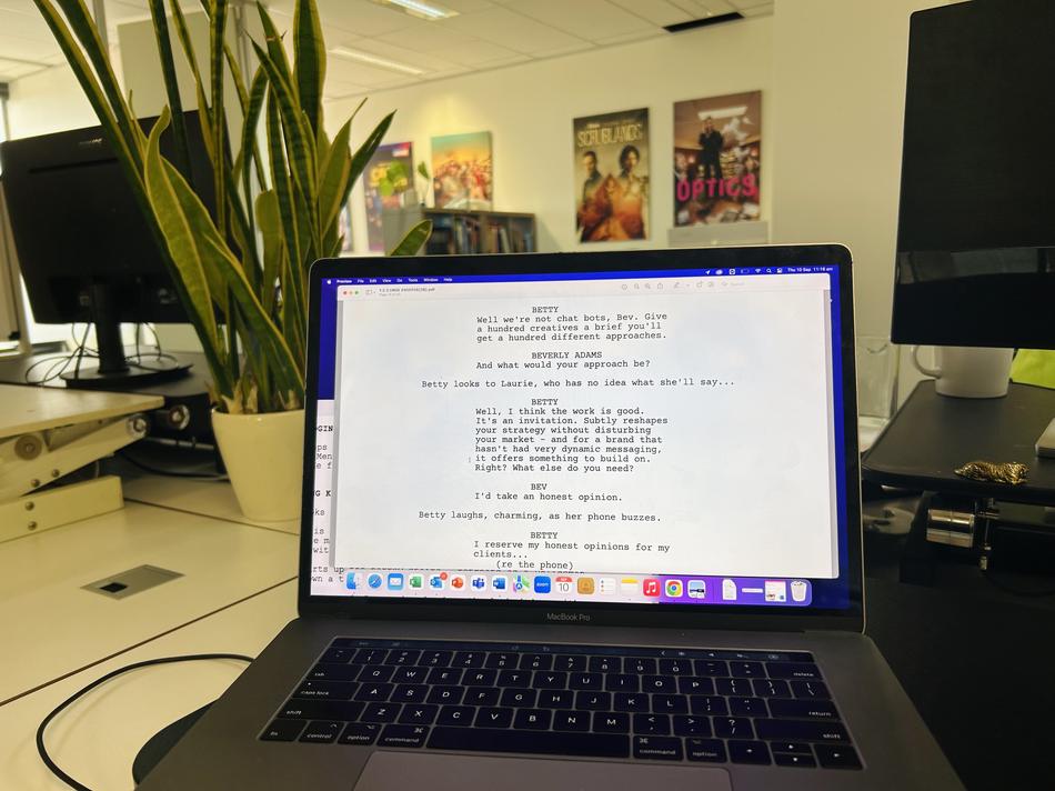 Laptop with a script on a desk at the Easy Tiger office
