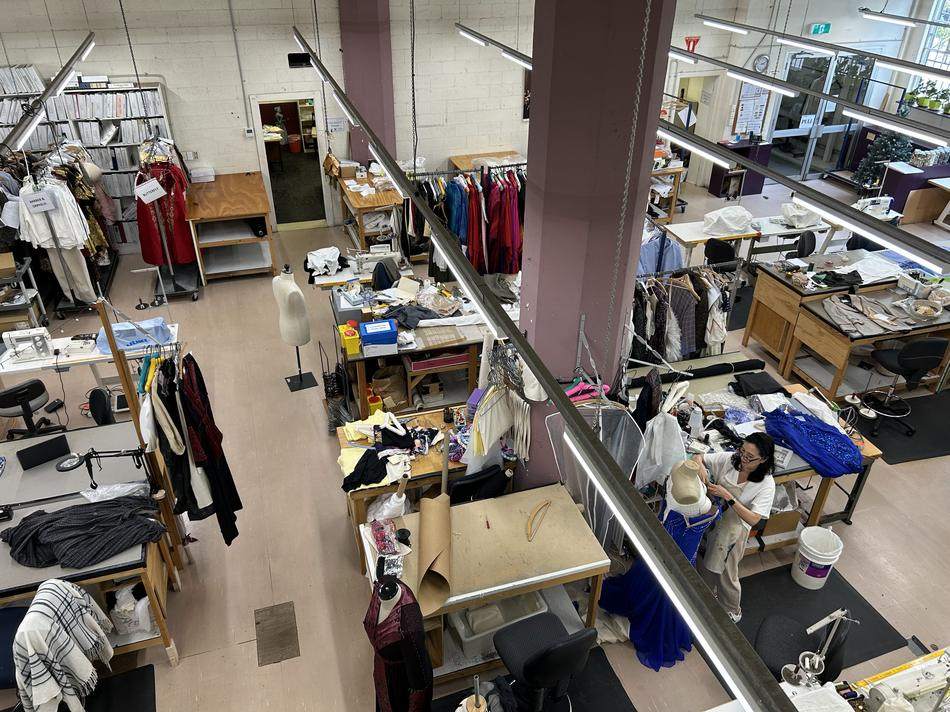 The Opera Australia costume workshop full of work tables