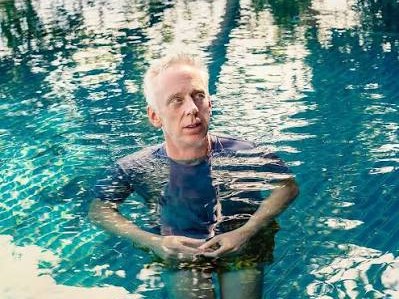 Mike White in a swimming pool
