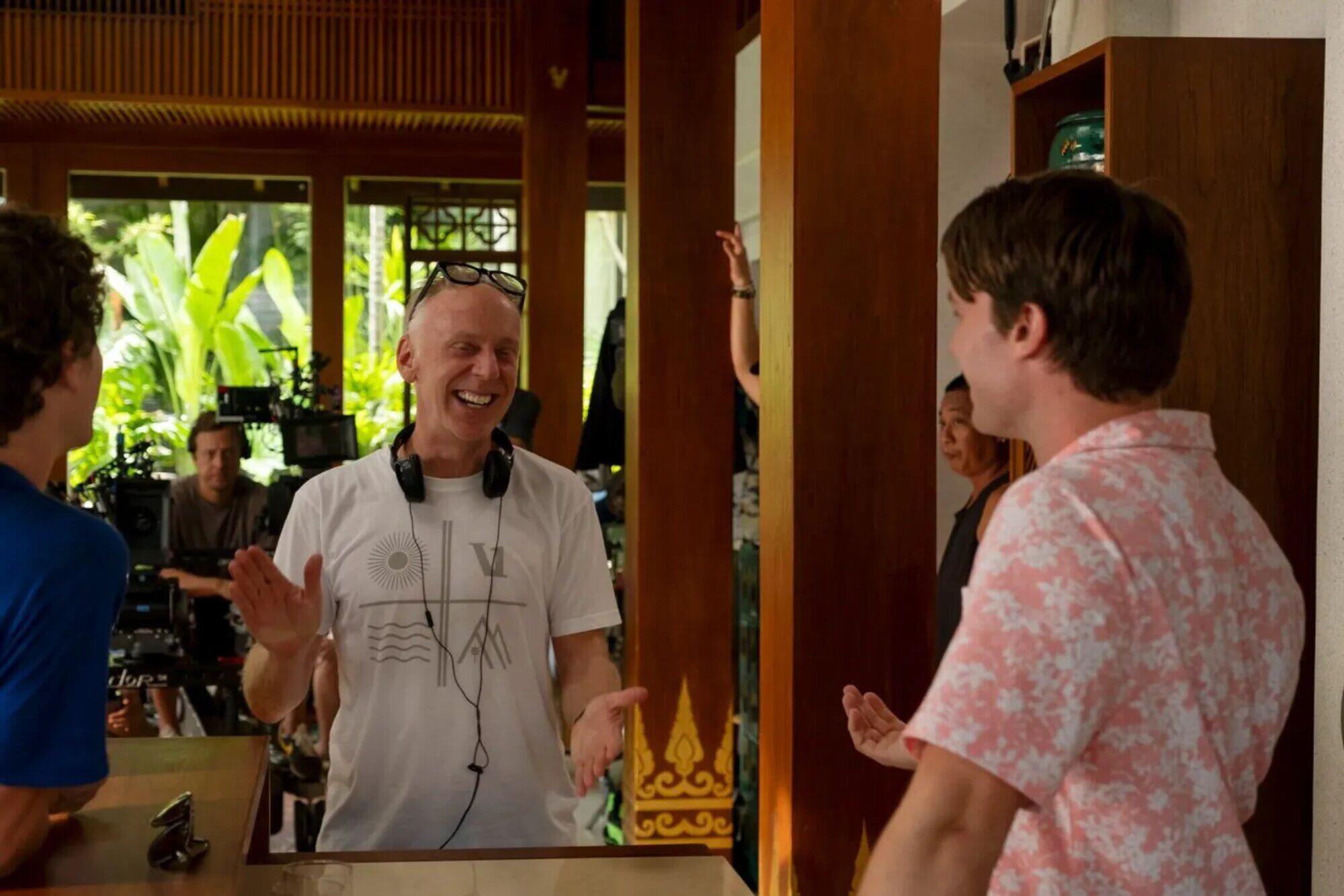 Mike White laughing on the set of The White Lotus