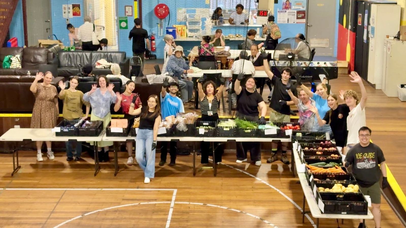 The whole Food Circle volunteer team waving goodbye at the end of a session